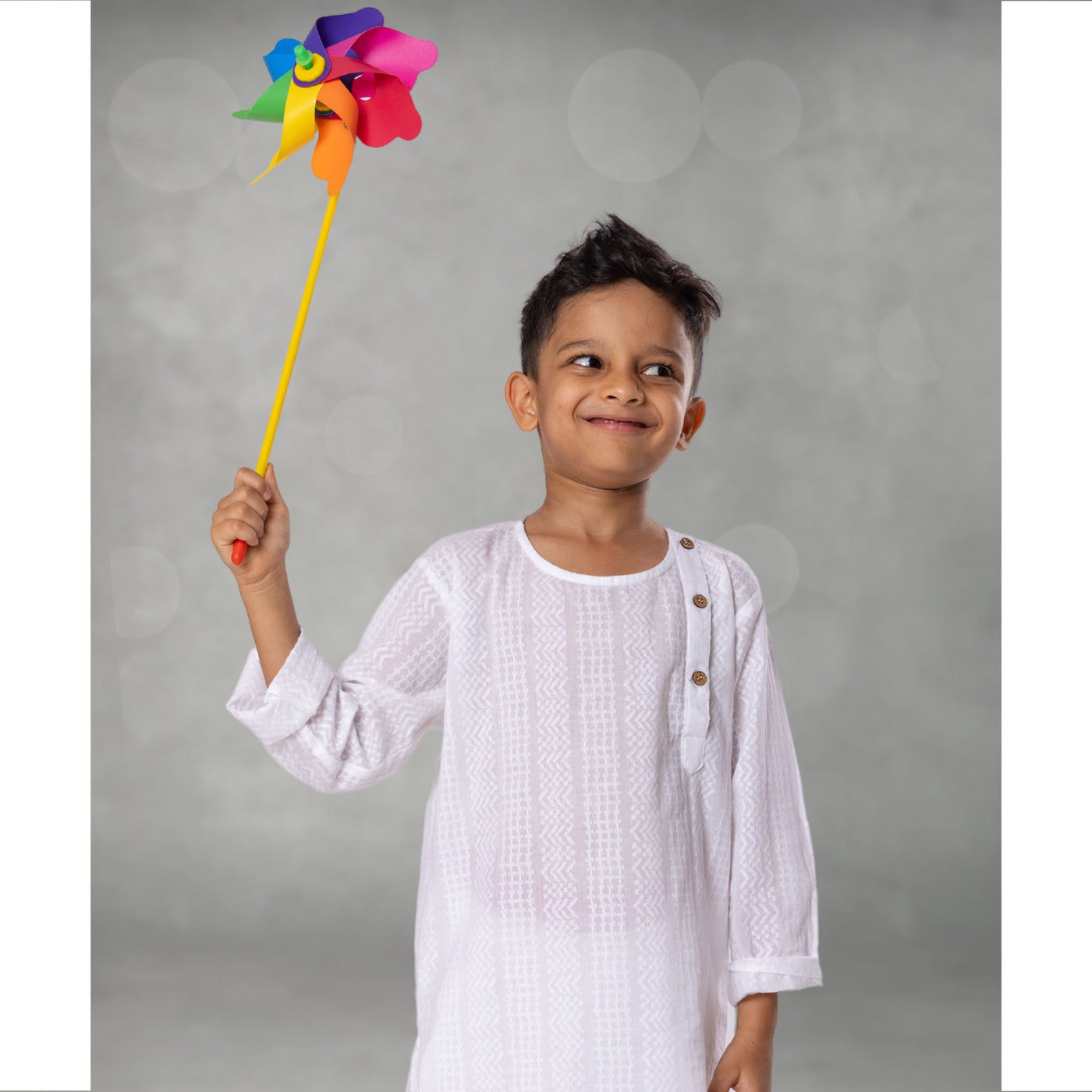 soft white kurta for boys with wooden button and self weave pattern